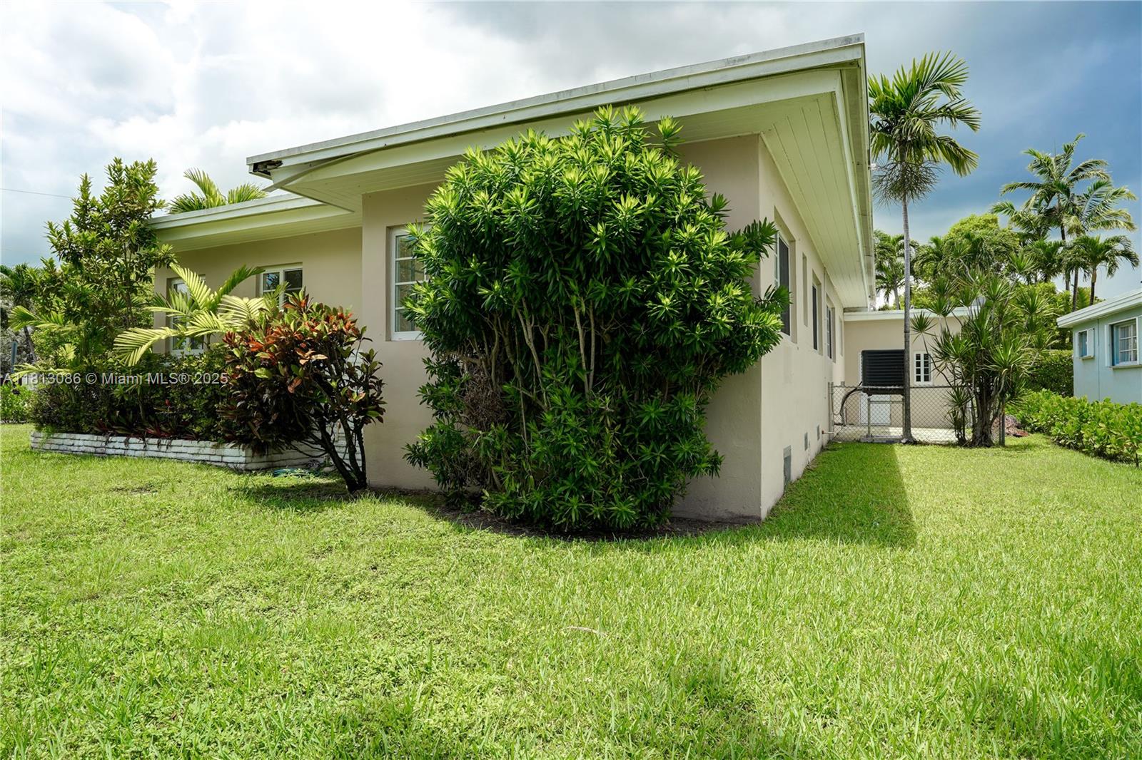 1201 South Biscayne Point Road Miami Beach, FL 33141 - Photo 23 of 35 a view of a garden with a fountain