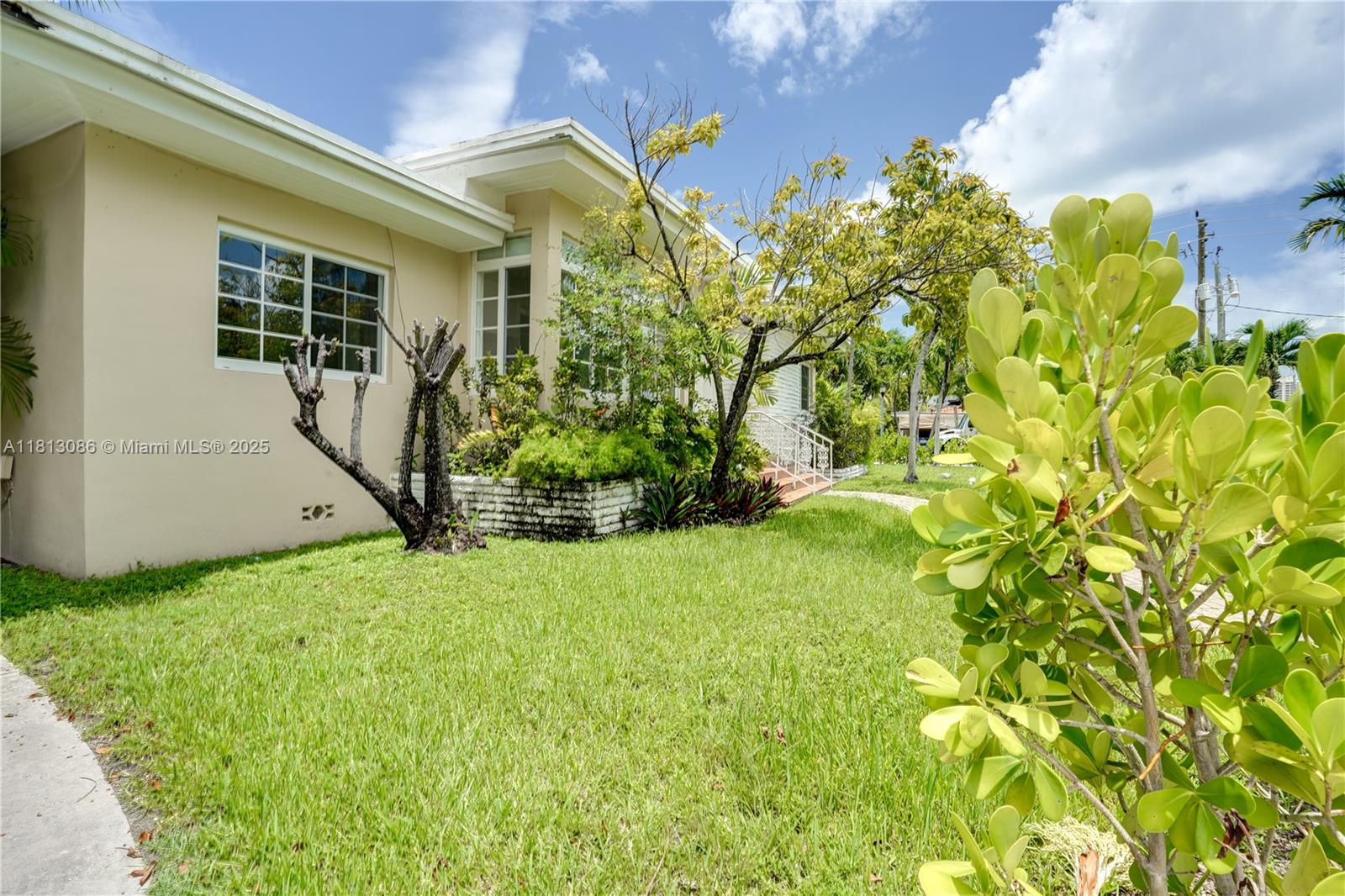 1201 South Biscayne Point Road Miami Beach, FL 33141 - Photo 24 of 35 a view of a backyard of the house