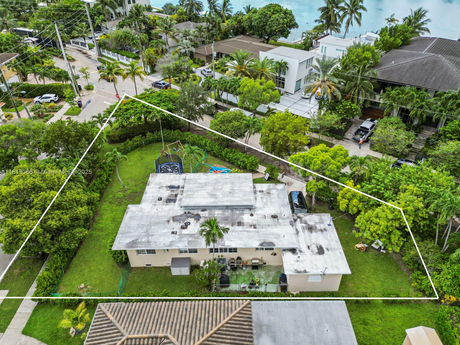 1201 South Biscayne Point Road Miami Beach, FL 33141 - Photo 30 of 35 an aerial view of a house with a yard