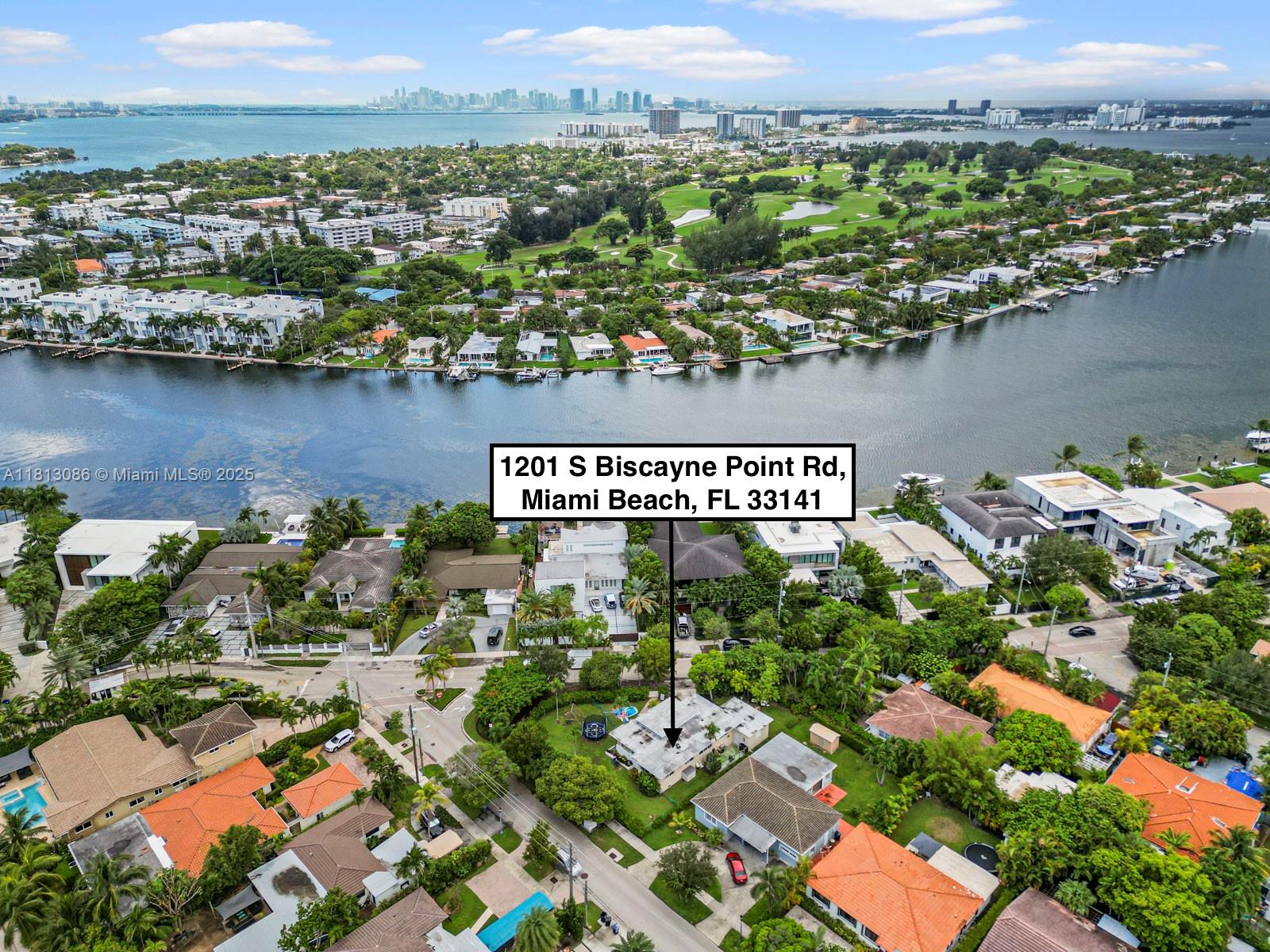 1201 South Biscayne Point Road Miami Beach, FL 33141 - Photo 3 of 35 an aerial view of a house with a lake view