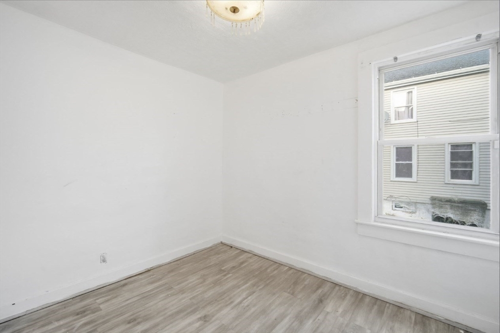 53 Fremont Street, Unit 1 Springfield, MA 01105 - Photo 5 of 9 a view of a room that has a window in it