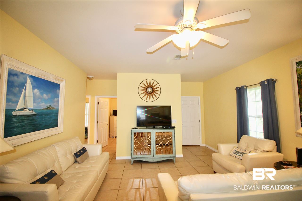 4374 Lindsey Lane, Unit 4374A Orange Beach, AL 36561 - Photo 7 of 20 White Leather furniture, sofa is a sleeper sofa