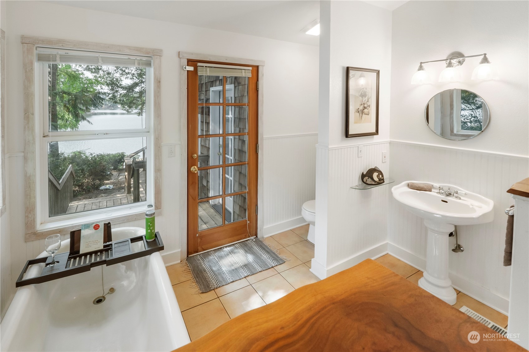 720 East Phillips Lake Loop Road Shelton, WA 98584 - Photo 15 of 31 a bathroom with a sink and a mirror