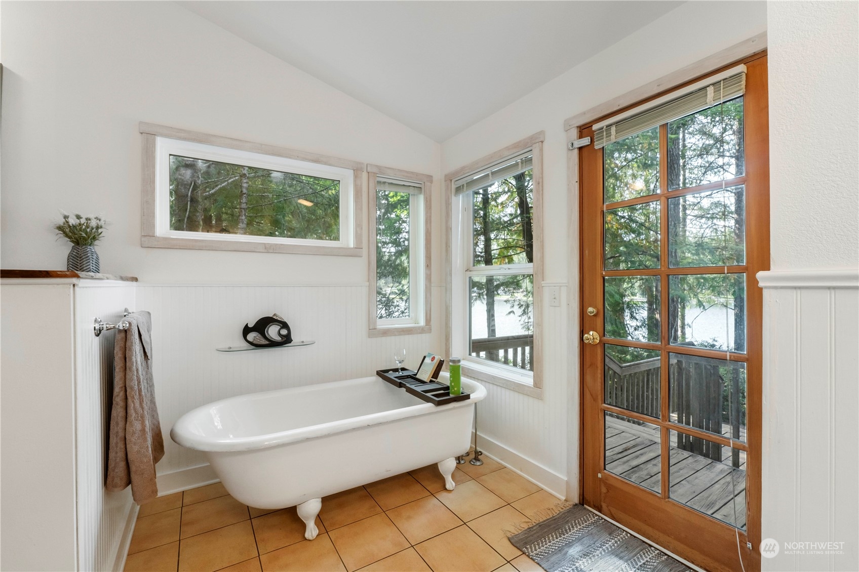 720 East Phillips Lake Loop Road Shelton, WA 98584 - Photo 17 of 31 a spacious bedroom with a bed and a window