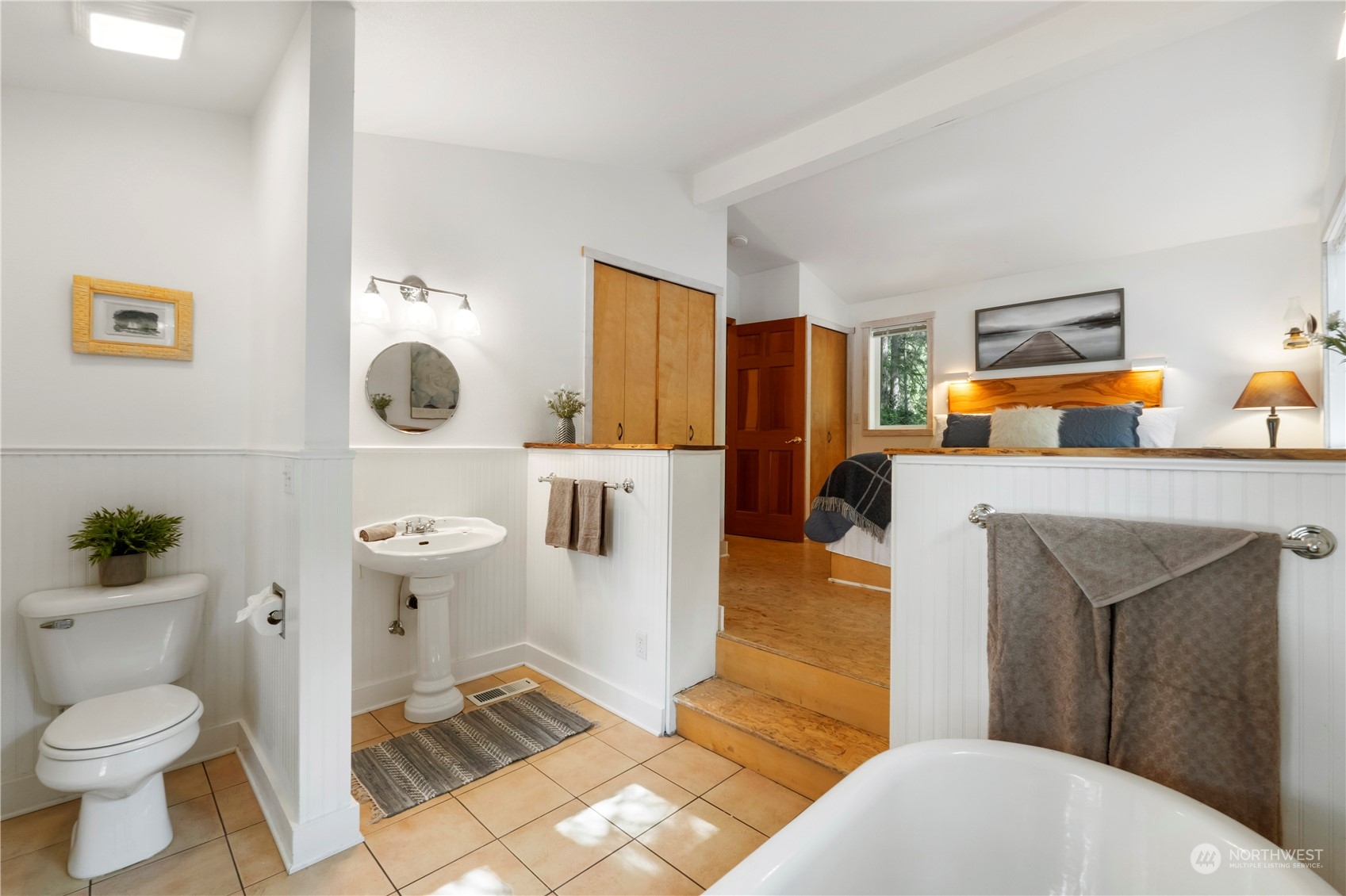 720 East Phillips Lake Loop Road Shelton, WA 98584 - Photo 18 of 31 a bathroom with a sink toilet and mirror
