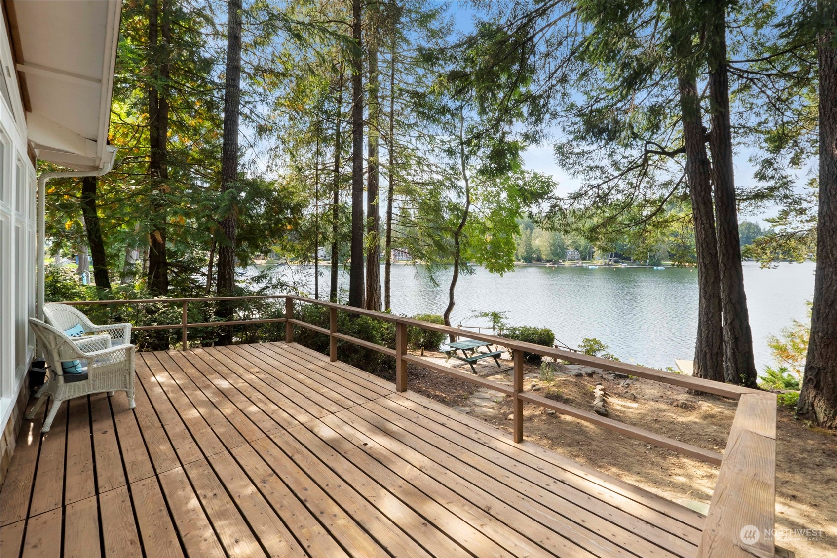 720 East Phillips Lake Loop Road Shelton, WA 98584 - Photo 21 of 31 a view of a terrace with chairs and wooden floor