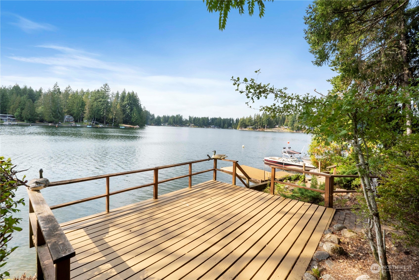 720 East Phillips Lake Loop Road Shelton, WA 98584 - Photo 22 of 31 a view of a lake with outdoor seating