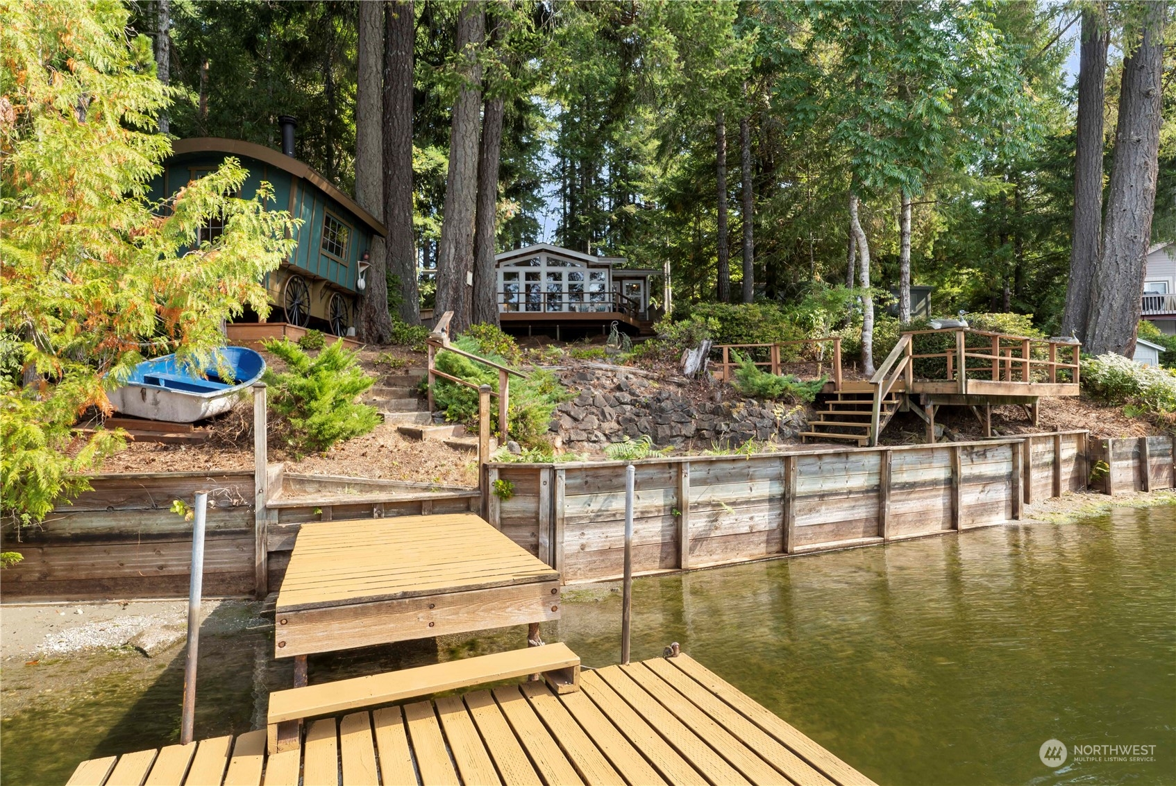 720 East Phillips Lake Loop Road Shelton, WA 98584 - Photo 24 of 31 a swimming pool with chairs