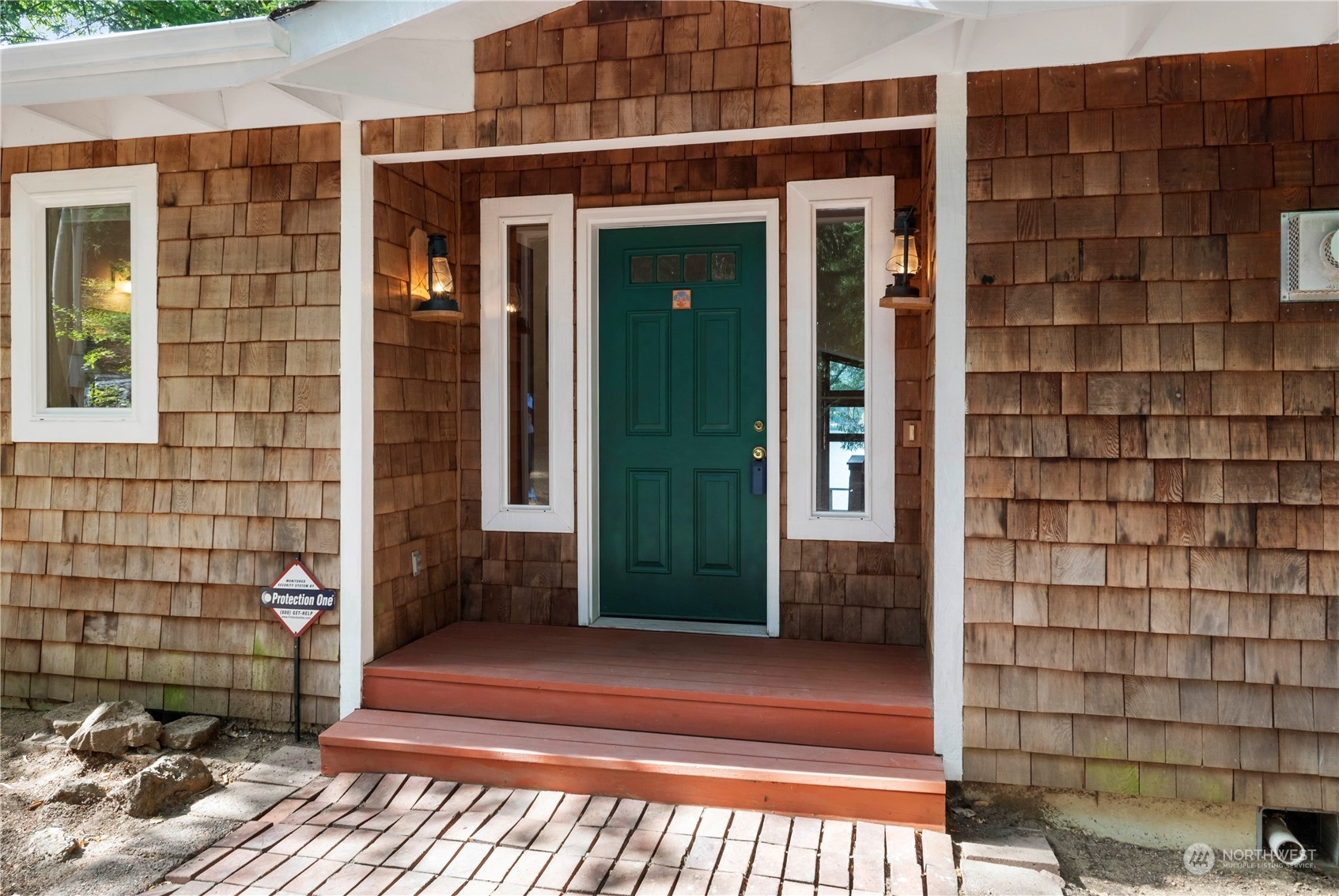 720 East Phillips Lake Loop Road Shelton, WA 98584 - Photo 3 of 31 a front view of a house with a shower