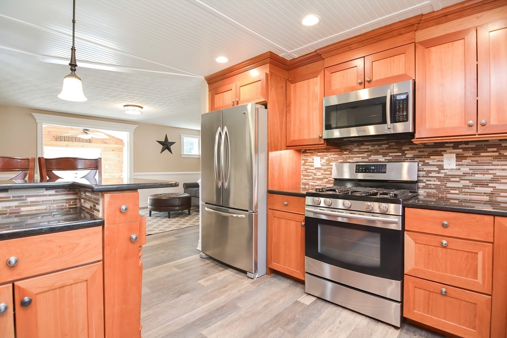 7 Northgate Road Franklin, MA 02038 - Photo 17 of 42 a kitchen with stainless steel appliances a stove microwave and refrigerator