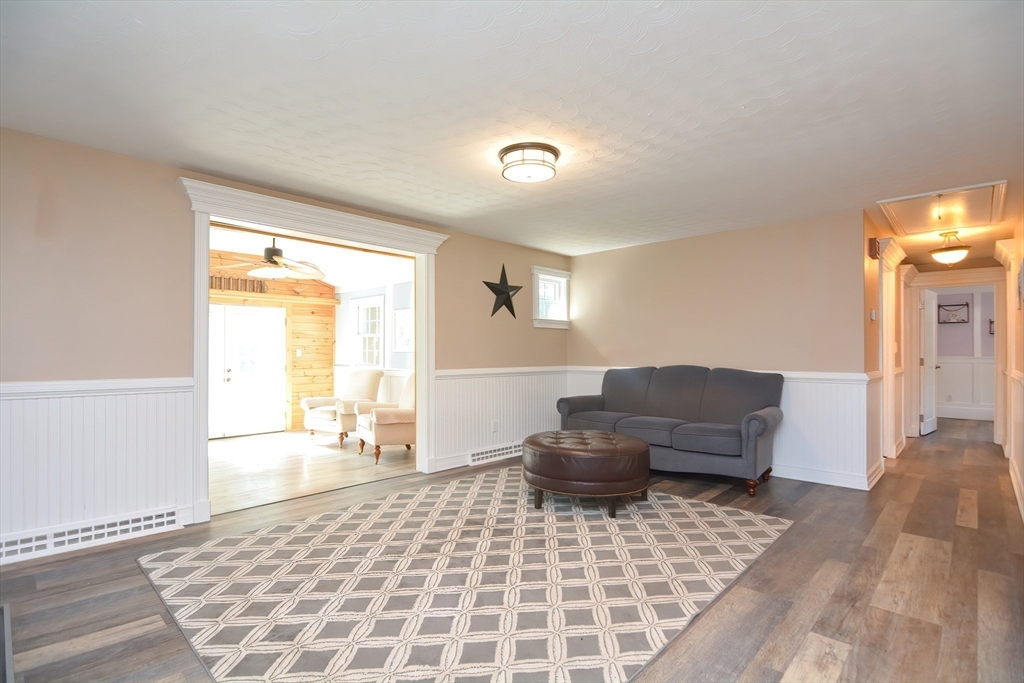7 Northgate Road Franklin, MA 02038 - Photo 22 of 42 a living room with furniture and a rug