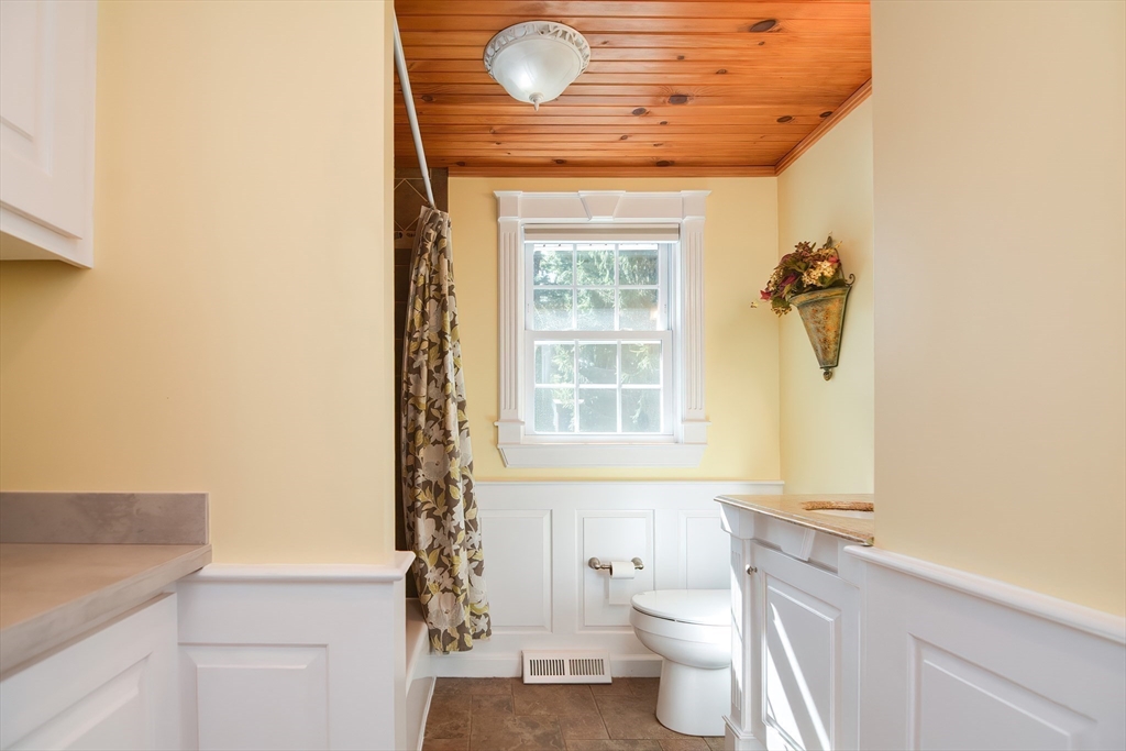 7 Northgate Road Franklin, MA 02038 - Photo 24 of 42 a bathroom with a granite countertop sink a toilet and shower