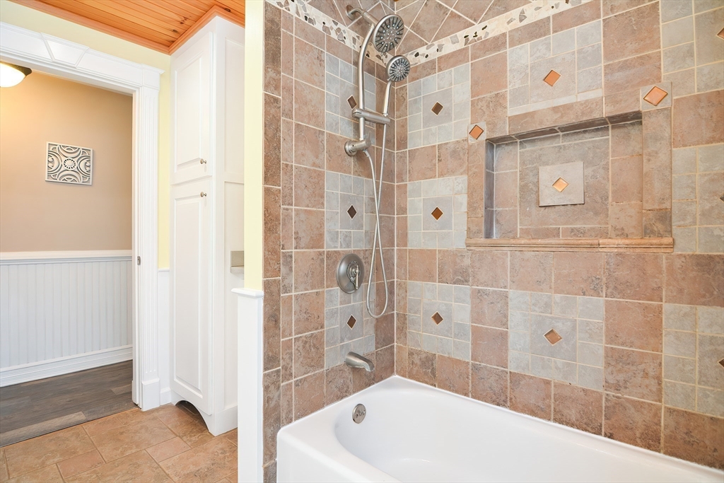 7 Northgate Road Franklin, MA 02038 - Photo 25 of 42 a bathroom with a bathtub and a shower