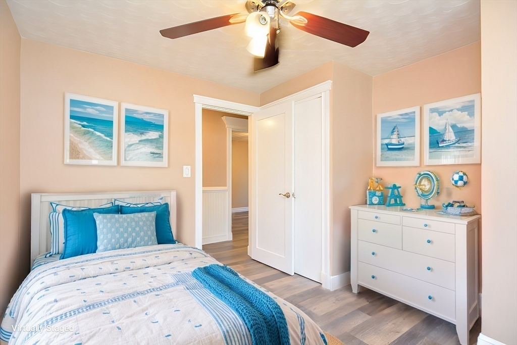 7 Northgate Road Franklin, MA 02038 - Photo 28 of 42 a bedroom with a bed and a dresser