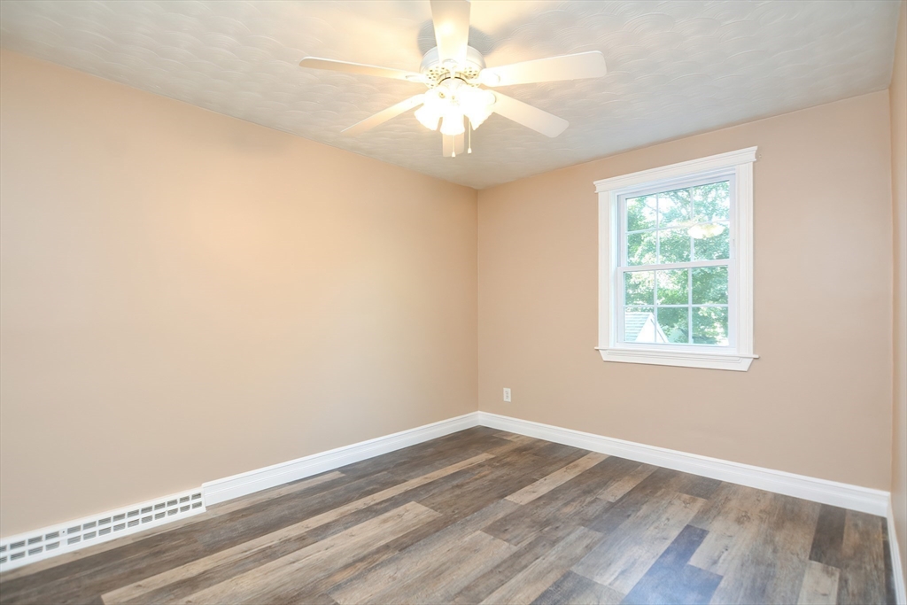 7 Northgate Road Franklin, MA 02038 - Photo 31 of 42 wooden floor in an empty room with a window