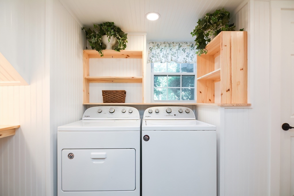 7 Northgate Road Franklin, MA 02038 - Photo 36 of 42 a view of washer and dryer with bathroom in the background