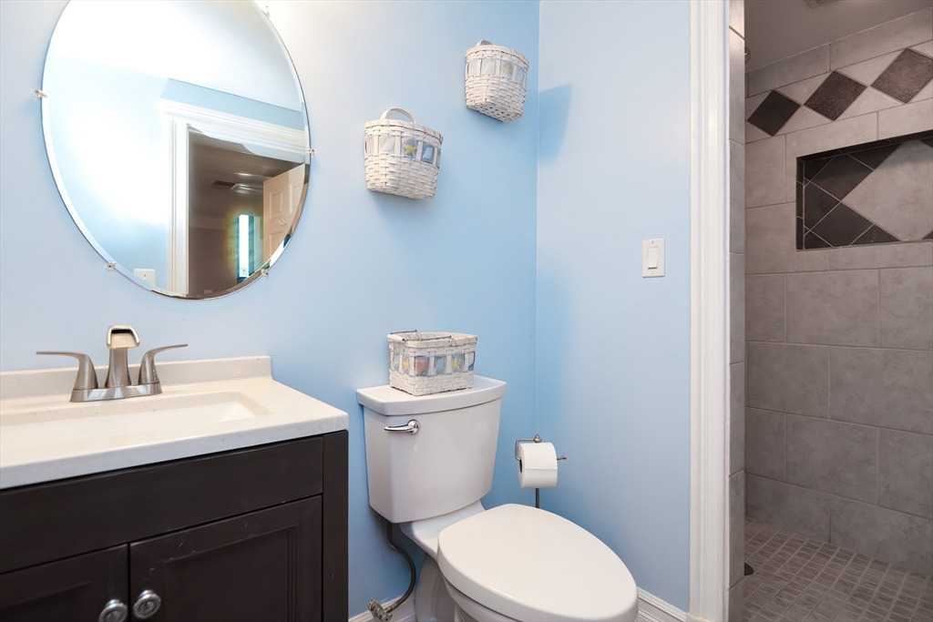 7 Northgate Road Franklin, MA 02038 - Photo 38 of 42 a bathroom with a toilet sink and mirror