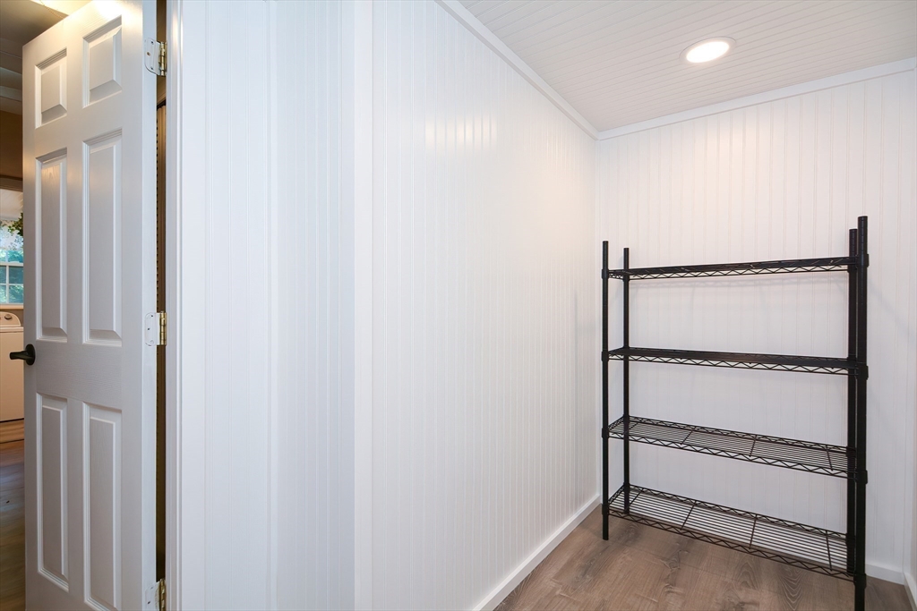 7 Northgate Road Franklin, MA 02038 - Photo 40 of 42 a view of a room with racks on the wall