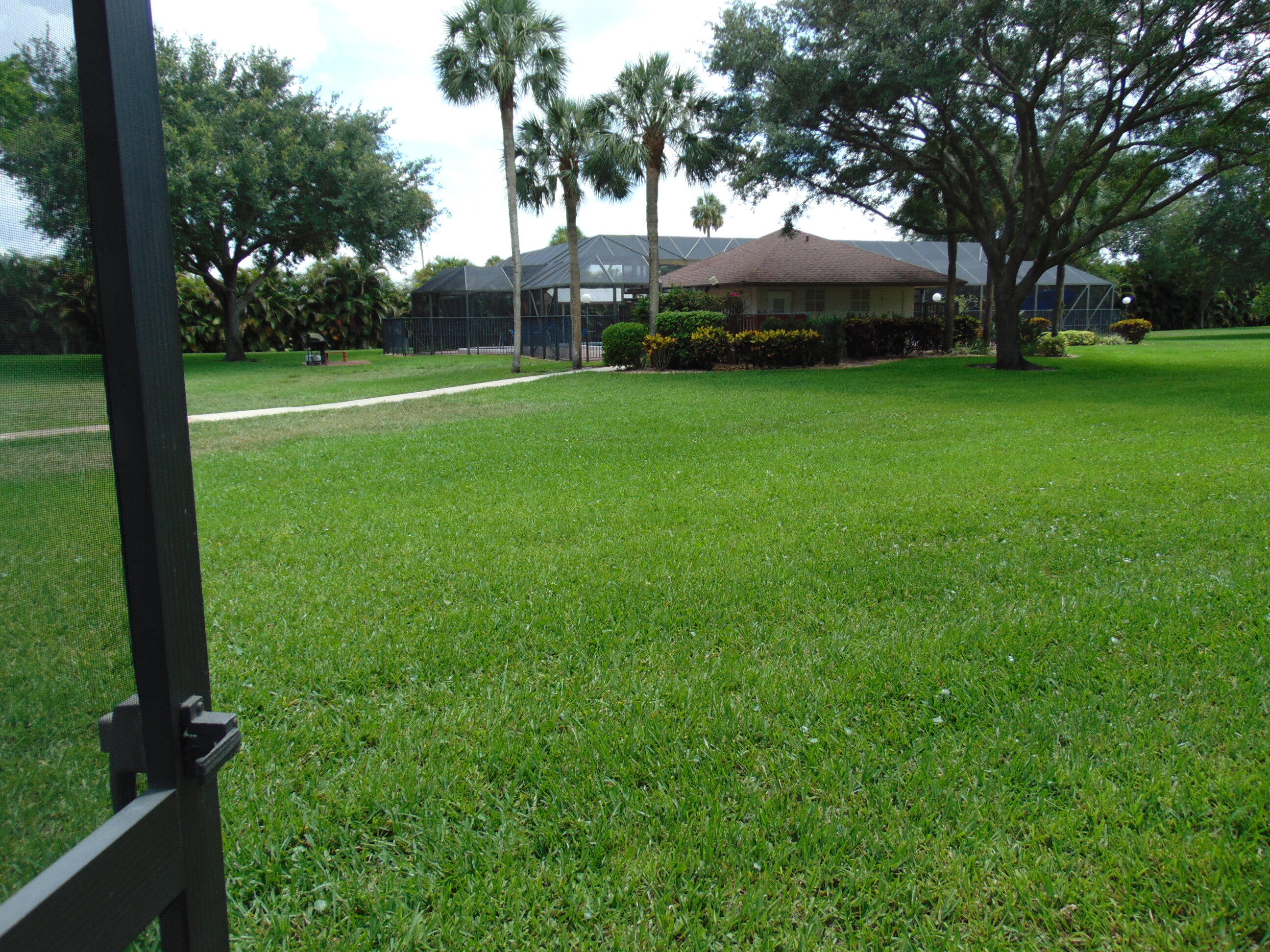 9220 Southwest 14th Street, Unit 3103 Boca Raton, FL 33428 - Photo 39 of 58 a view of a park and trees