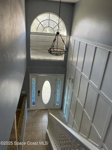 a view of staircase with a rug