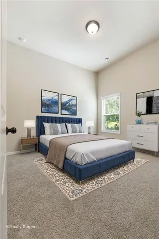 a bed room with a bed and a tv