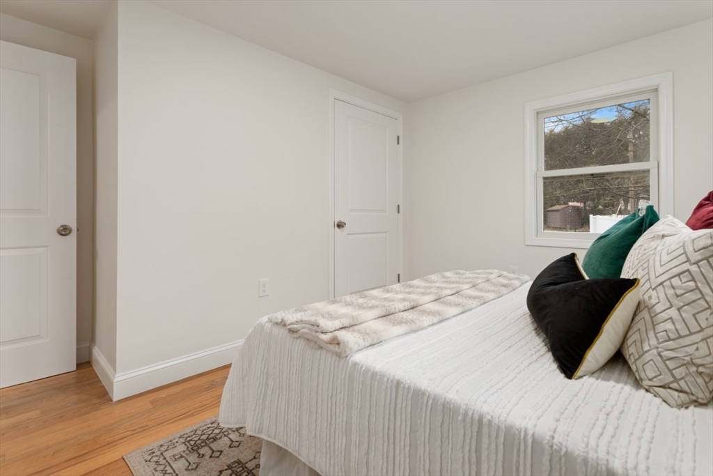 83 Riverbank Road Saugus, MA 01906 - Photo 24 of 36 a bedroom with a bed and a window