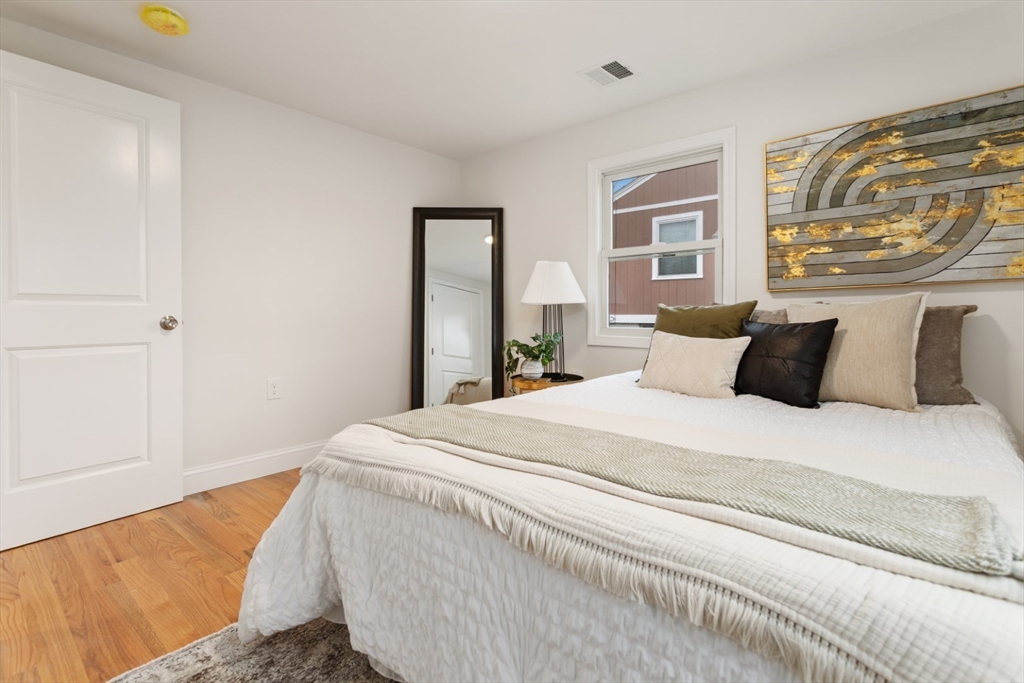 83 Riverbank Road Saugus, MA 01906 - Photo 27 of 36 a bedroom with bed and window