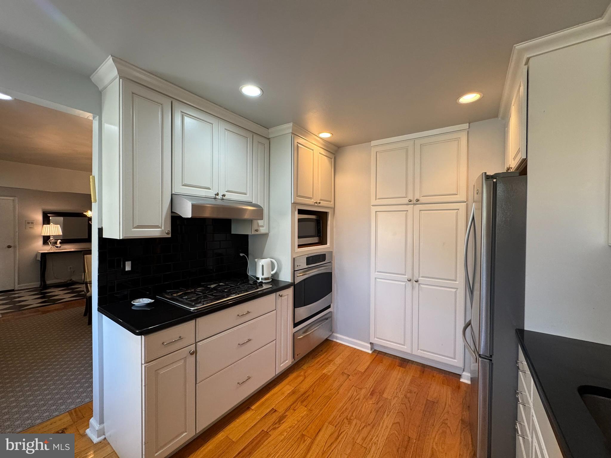 40 Old Lancaster Road, Unit 215 Merion Station, PA 19066 - Photo 10 of 23 Kitchen with Abundant Cabinetry