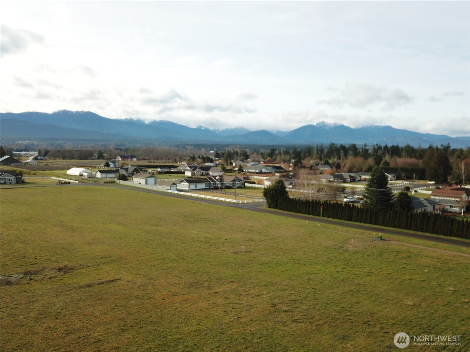 9999 Wheeler Road Sequim, WA 98382 - Photo 4 of 11 a view of an ocean with city