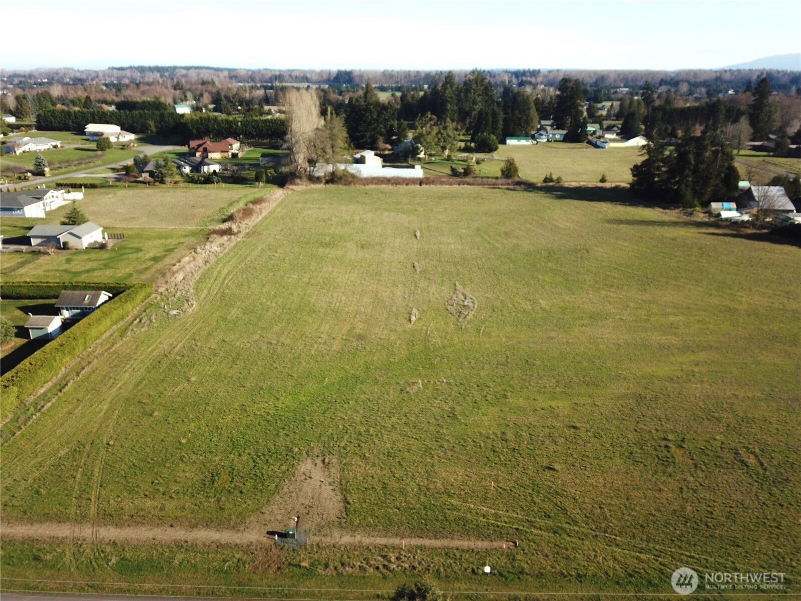 9999 Wheeler Road Sequim, WA 98382 - Photo 10 of 11 a view of swimming pool with outdoor seating