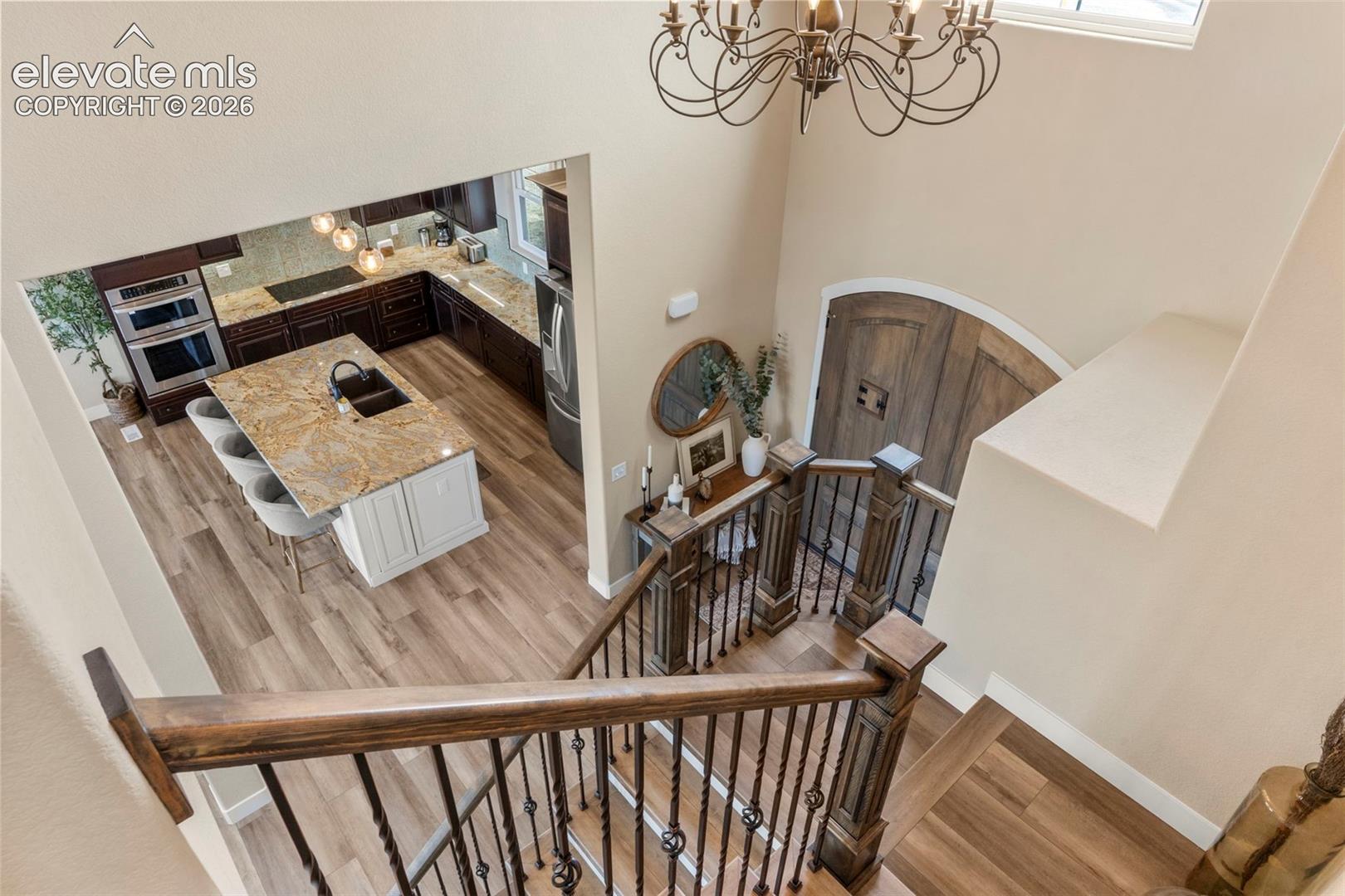 2480 North Log Road Calhan, CO 80808 - Photo 23 of 50 Grand entry and stairs