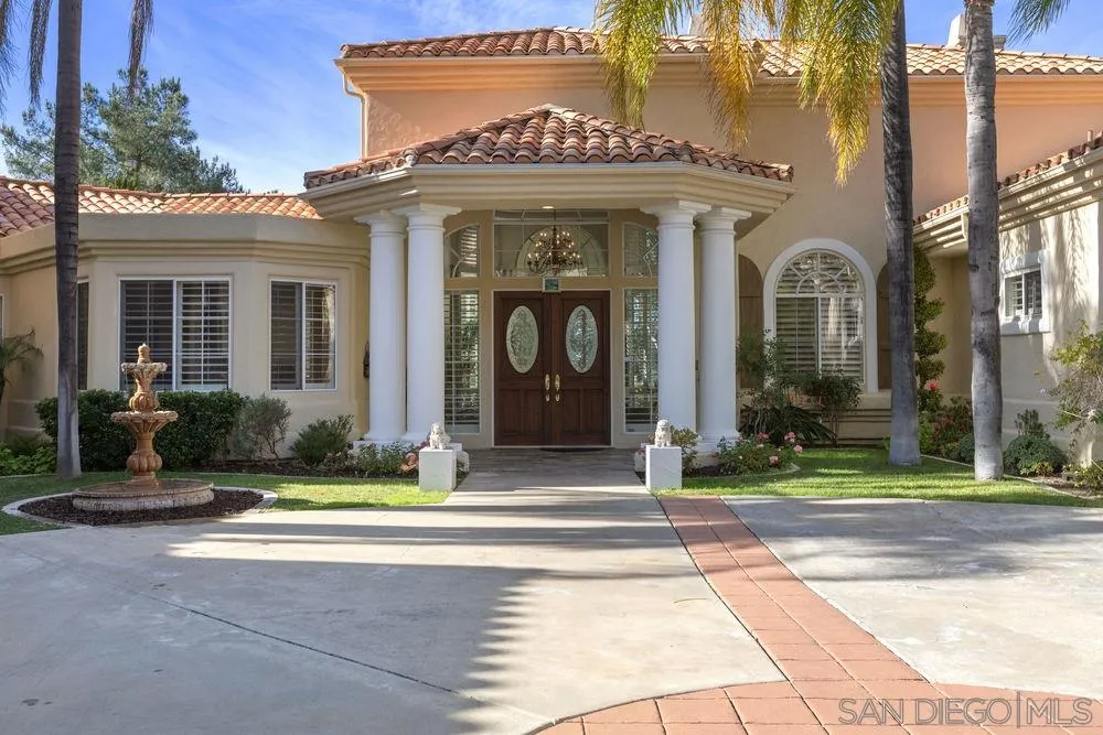 14331 Twisted Branch Road Poway, CA 92064 - Photo 2 of 25 front view of a brick house with a yard