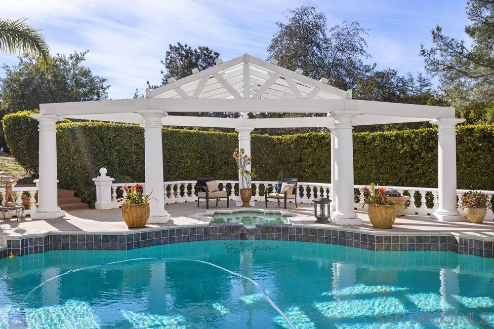14331 Twisted Branch Road Poway, CA 92064 - Photo 22 of 25 a front view of a house with garden and porch