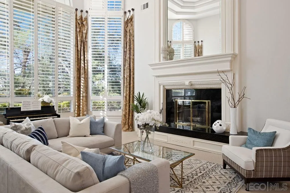 14331 Twisted Branch Road Poway, CA 92064 - Photo 3 of 25 a living room with furniture and a fireplace