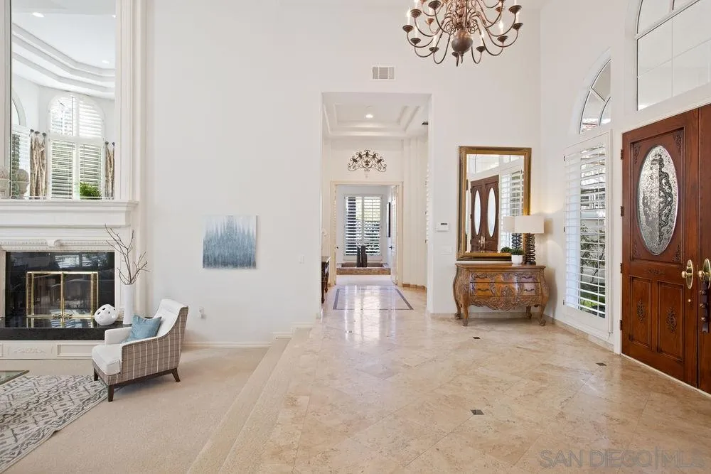 14331 Twisted Branch Road Poway, CA 92064 - Photo 4 of 25 a living room with furniture a fireplace and a flat screen tv