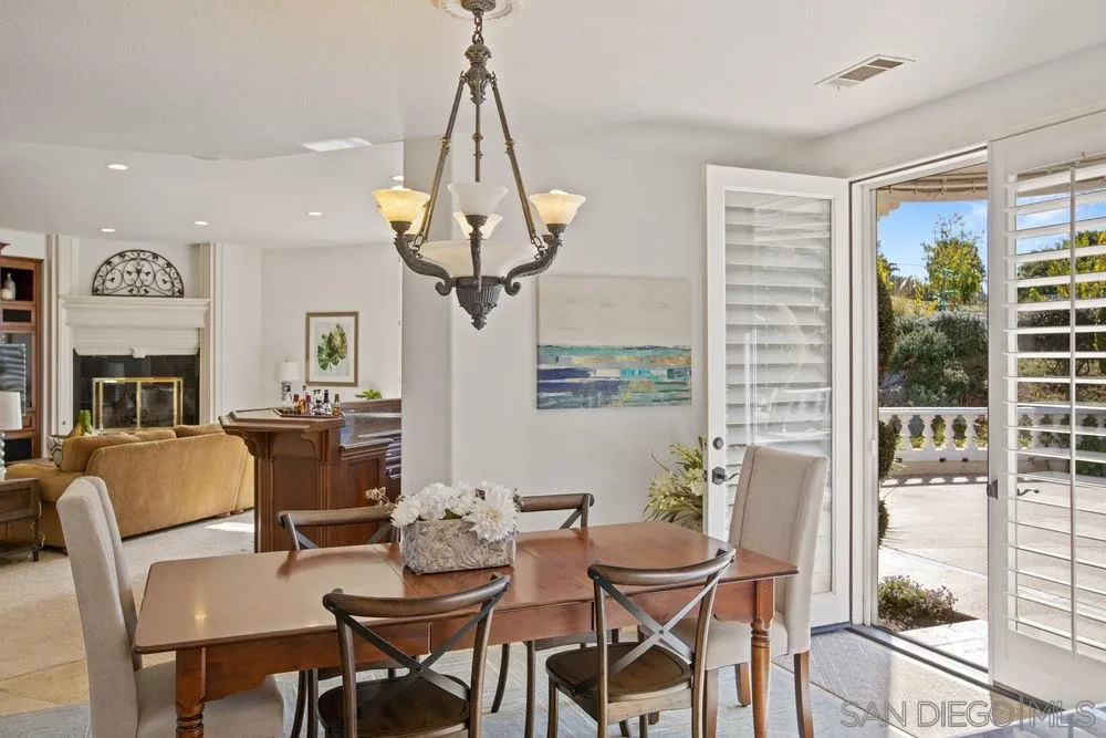14331 Twisted Branch Road Poway, CA 92064 - Photo 8 of 25 a view of a dining room with furniture window and outside view