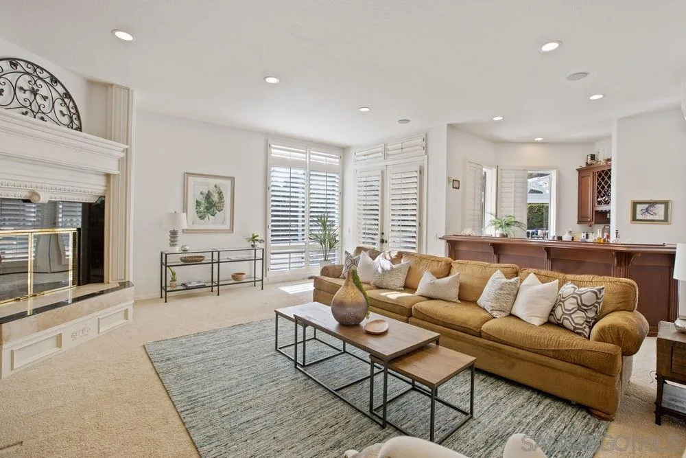 14331 Twisted Branch Road Poway, CA 92064 - Photo 9 of 25 a living room with furniture and a fireplace