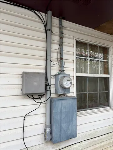 a fan sitting in front of a window
