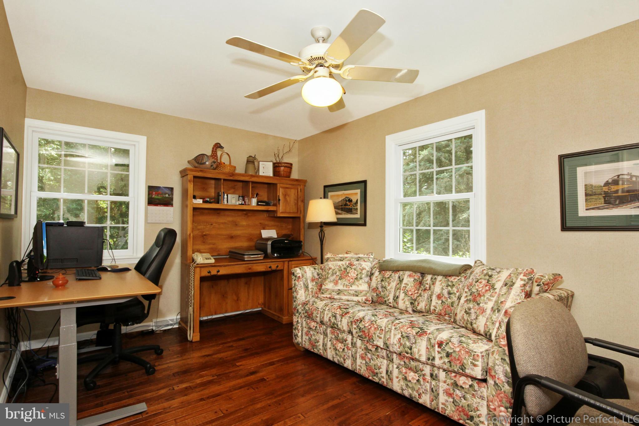 8309 Palmer Road Middletown, MD 21769 - Photo 14 of 29 a living room with furniture and a large window