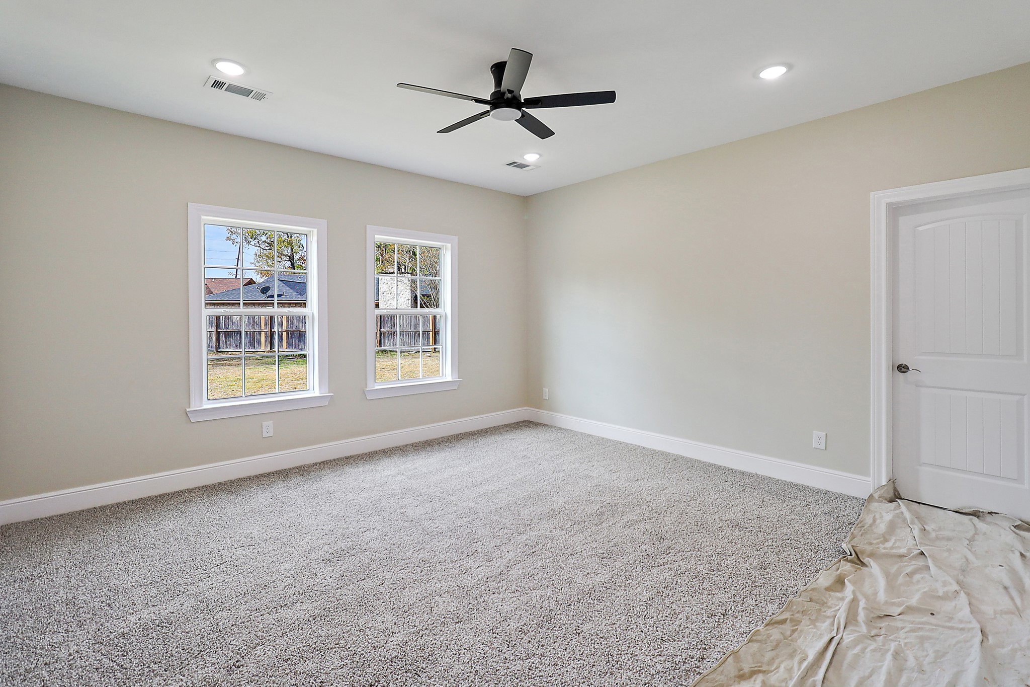 15907 Castaway Court Crosby, TX 77532 - Photo 14 of 26 wooden floor in an empty room with a window