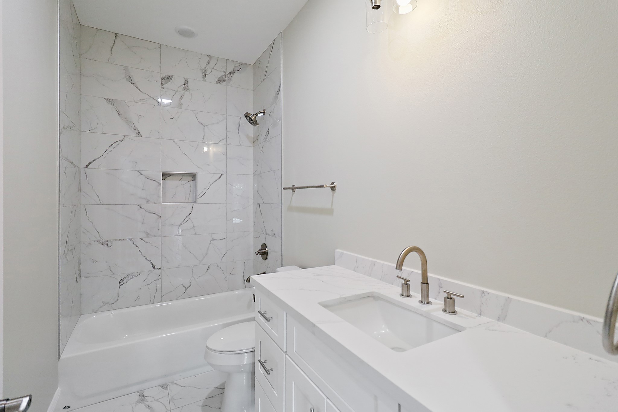 15907 Castaway Court Crosby, TX 77532 - Photo 21 of 26 a bathroom with a sink a toilet and shower