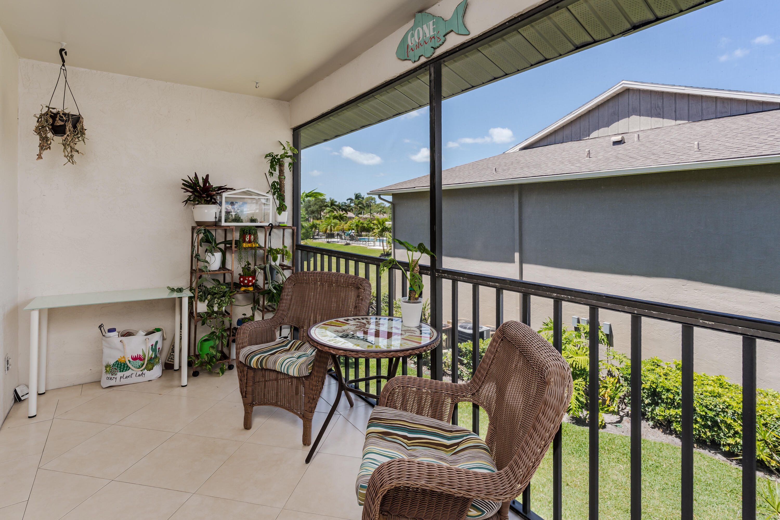 5697 Rattlesnake Hammock Road, Unit C201 Naples, FL 34113 - Photo 15 of 27 Lanai View