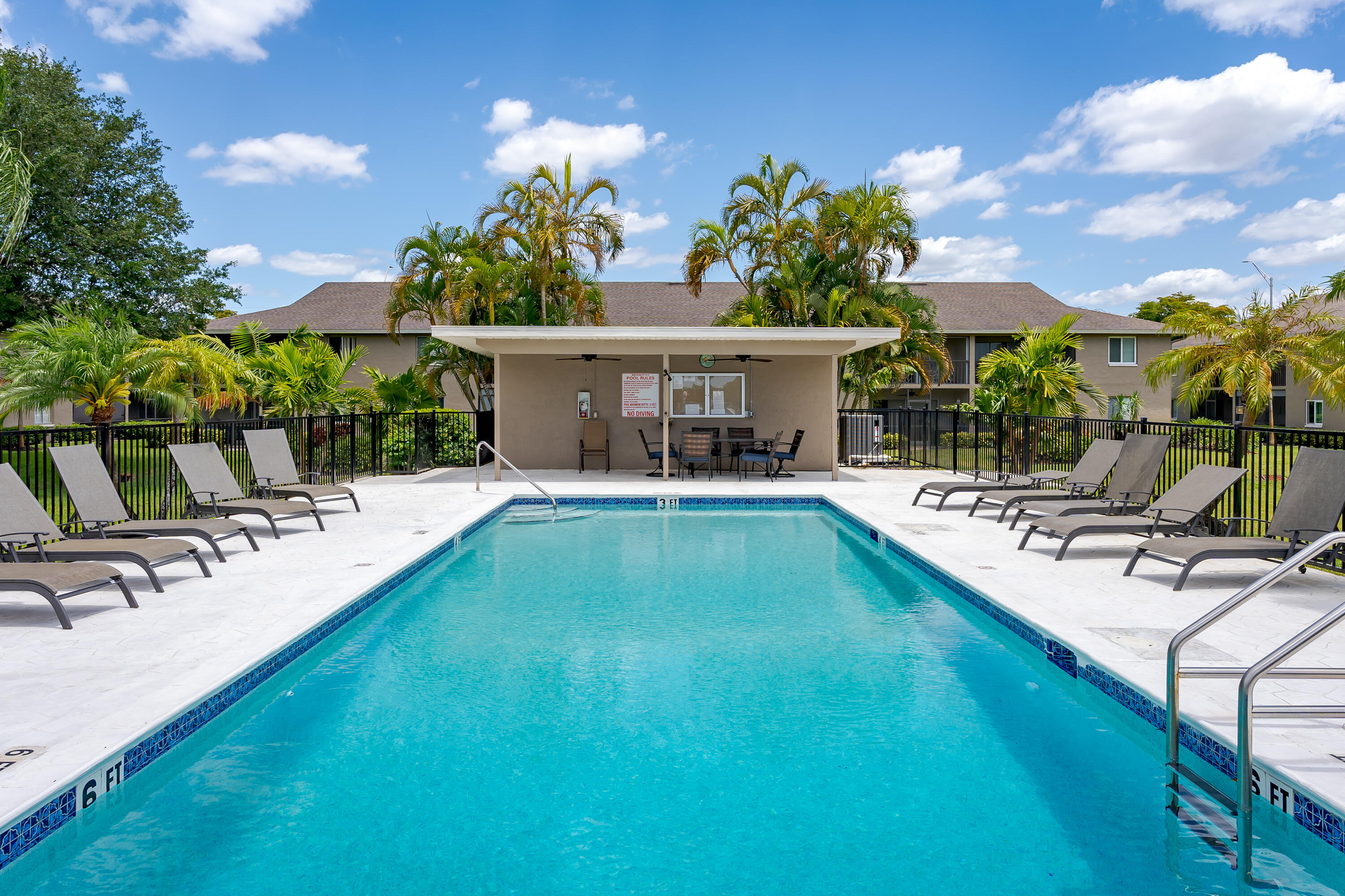 5697 Rattlesnake Hammock Road, Unit C201 Naples, FL 34113 - Photo 20 of 27 Pool View