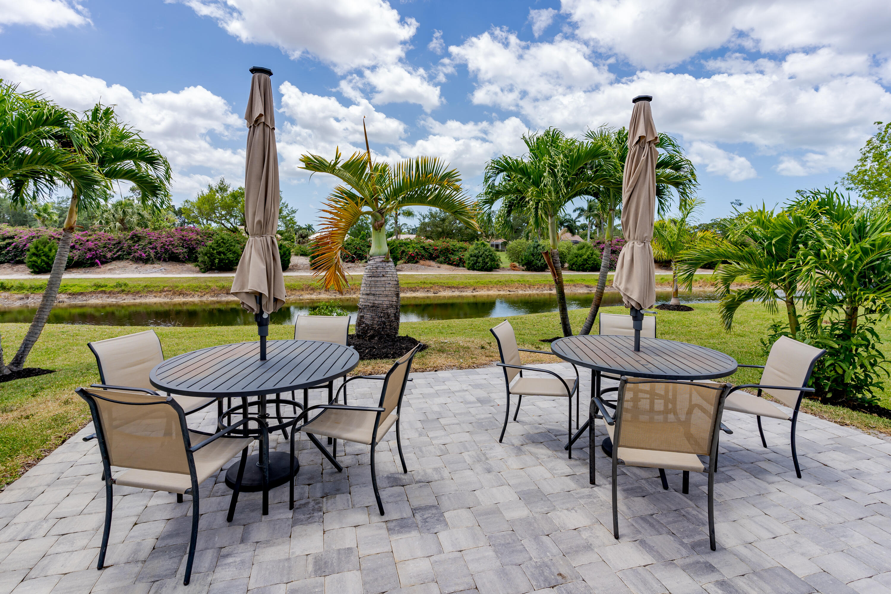 5697 Rattlesnake Hammock Road, Unit C201 Naples, FL 34113 - Photo 22 of 27 BBQ Area