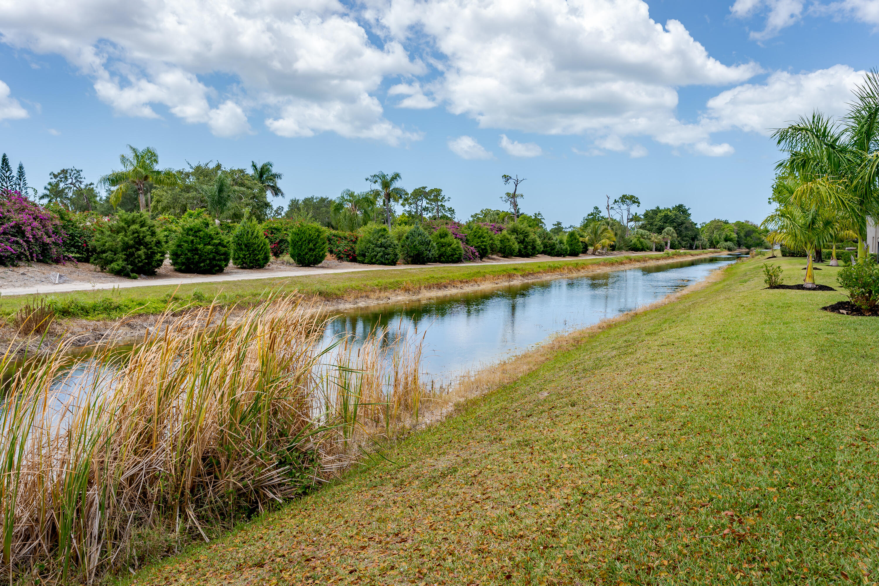 5697 Rattlesnake Hammock Road, Unit C201 Naples, FL 34113 - Photo 26 of 27 Common Grounds Area