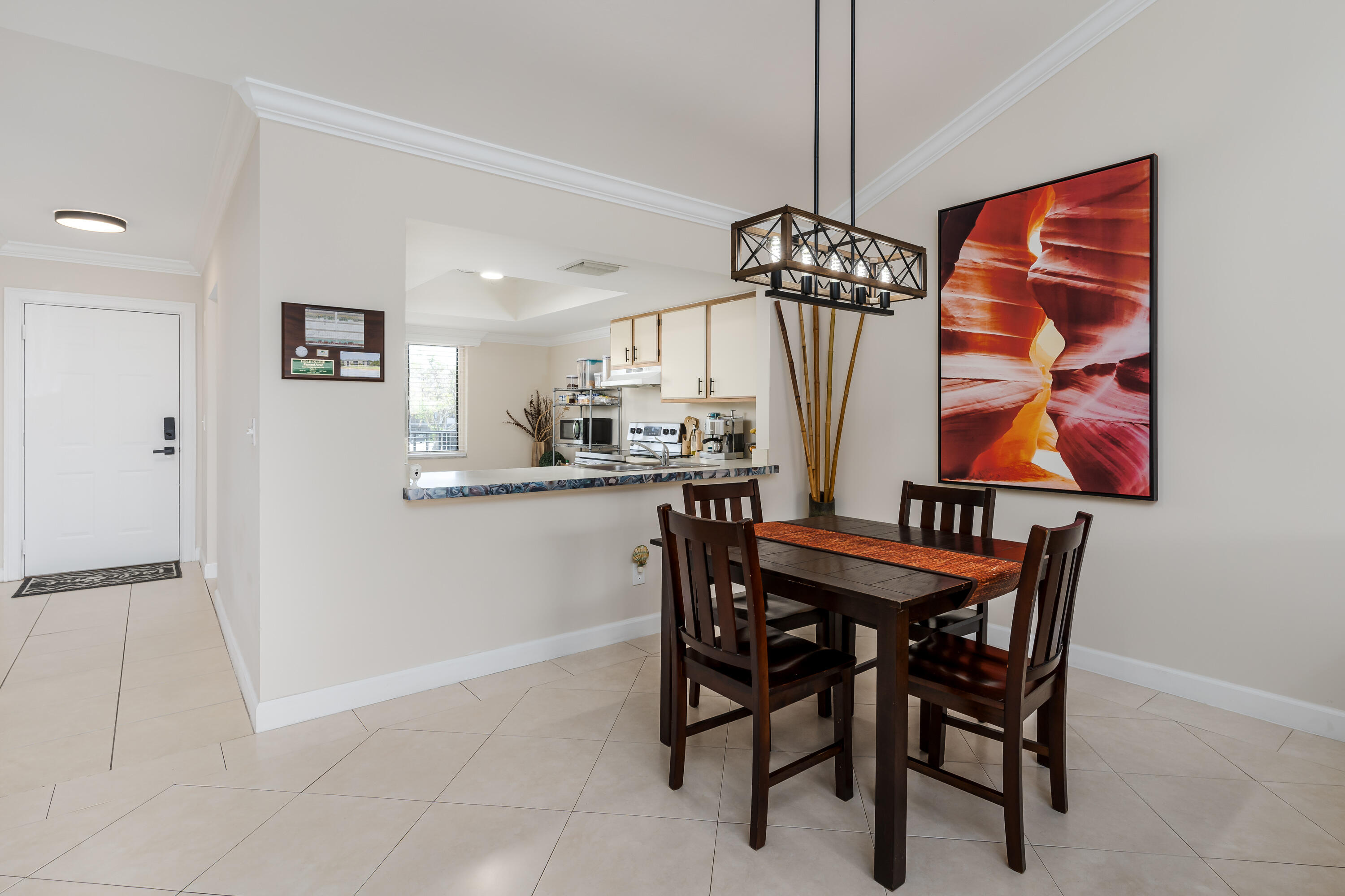 5697 Rattlesnake Hammock Road, Unit C201 Naples, FL 34113 - Photo 4 of 27 Dining Area