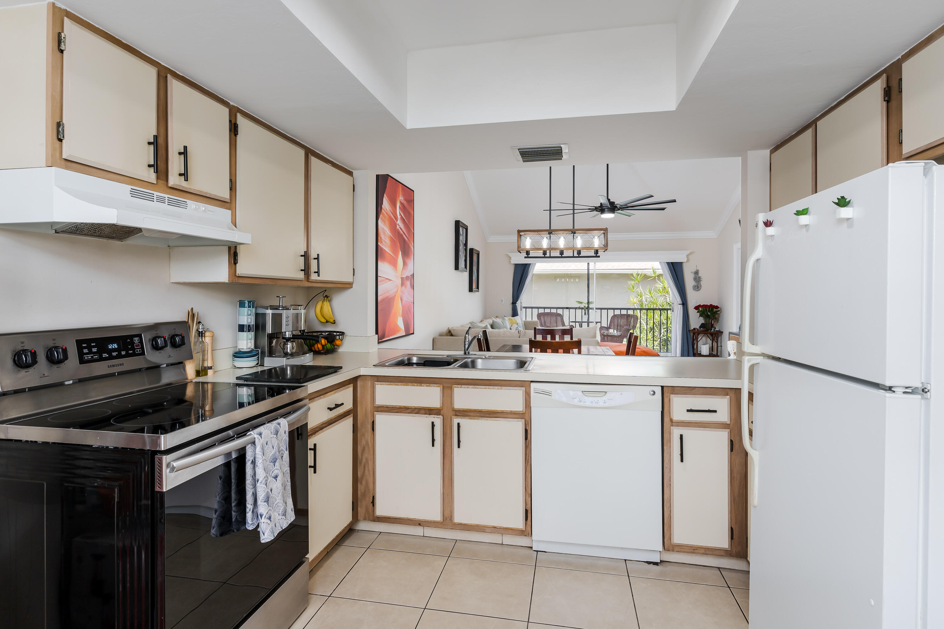 5697 Rattlesnake Hammock Road, Unit C201 Naples, FL 34113 - Photo 8 of 27 Kitchen View