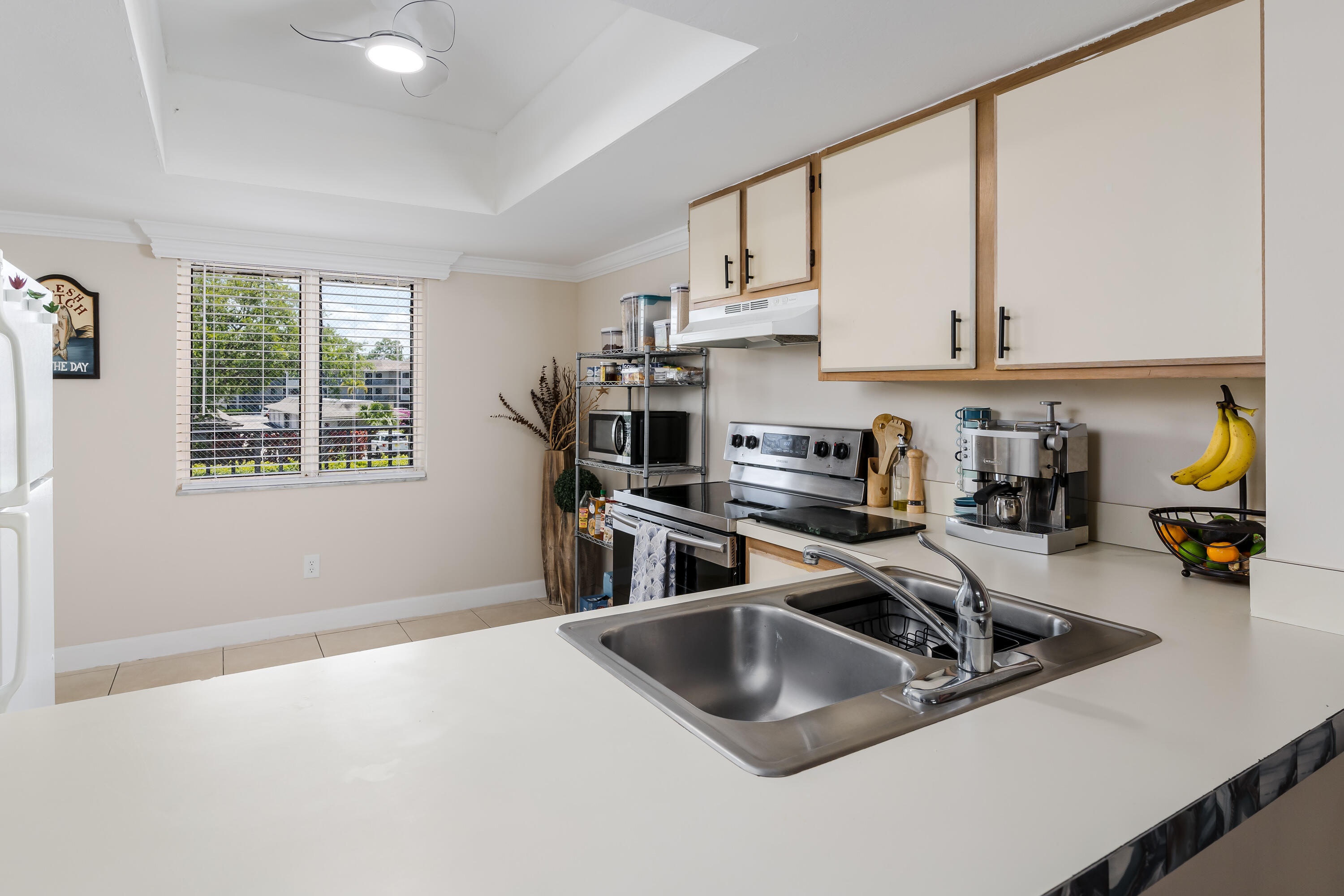 5697 Rattlesnake Hammock Road, Unit C201 Naples, FL 34113 - Photo 9 of 27 Kitchen Counter