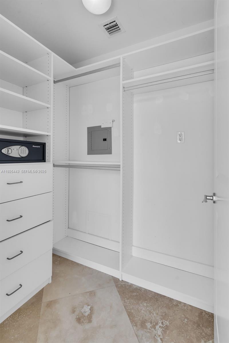 315 Northeast 3rd Avenue, Unit 1805 Fort Lauderdale, FL 33301 - Photo 19 of 43 a view of white cabinets