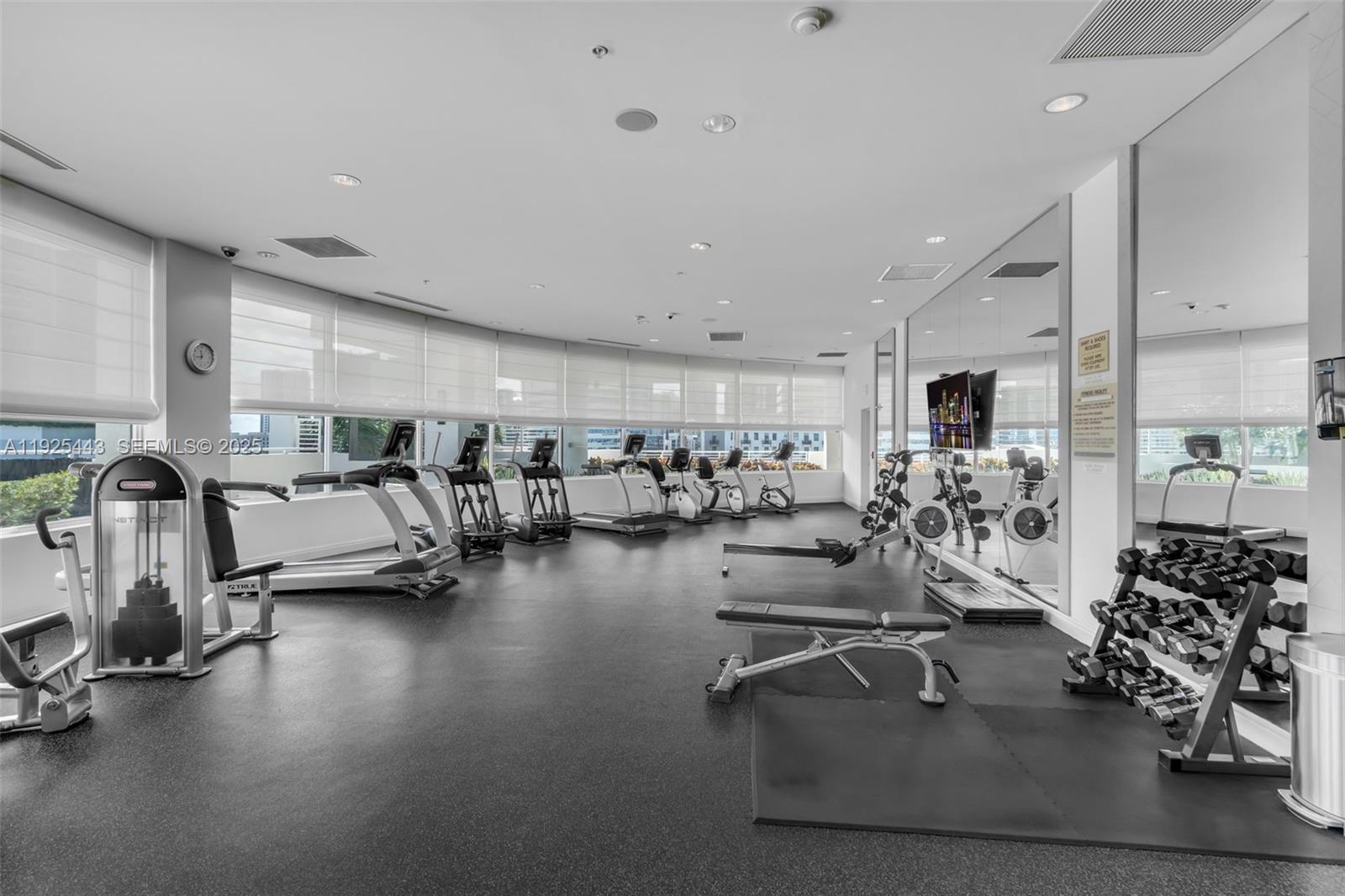 315 Northeast 3rd Avenue, Unit 1805 Fort Lauderdale, FL 33301 - Photo 31 of 43 a view of a room with gym equipment